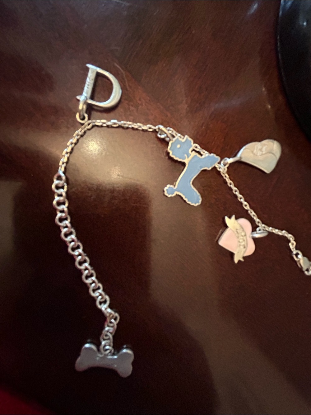 Authentic Baby Dior Multi Charm Silver Bracelet